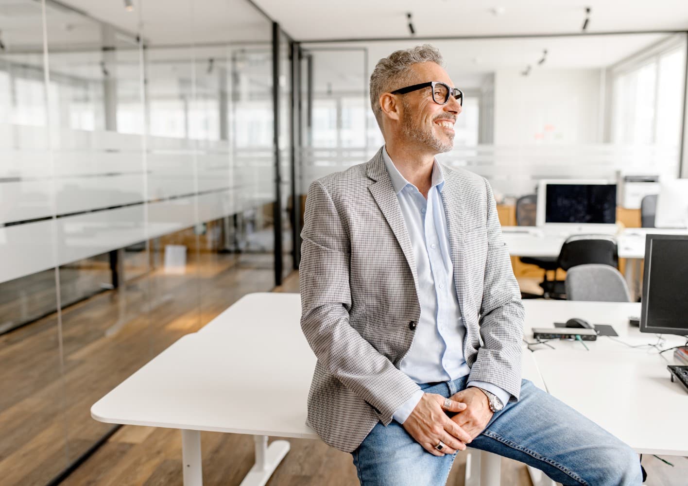 man sitting on desk