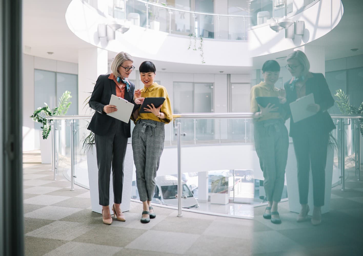 two women meeting in the hallway