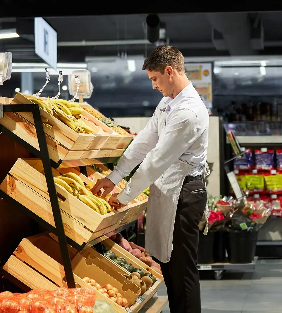 employee-of-grocery-store-working